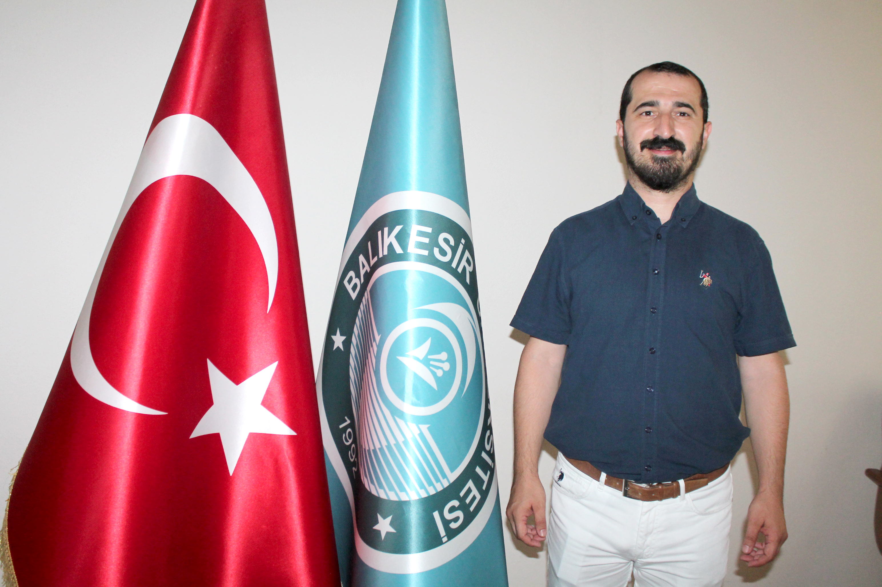 UĞUR KORKMAZ